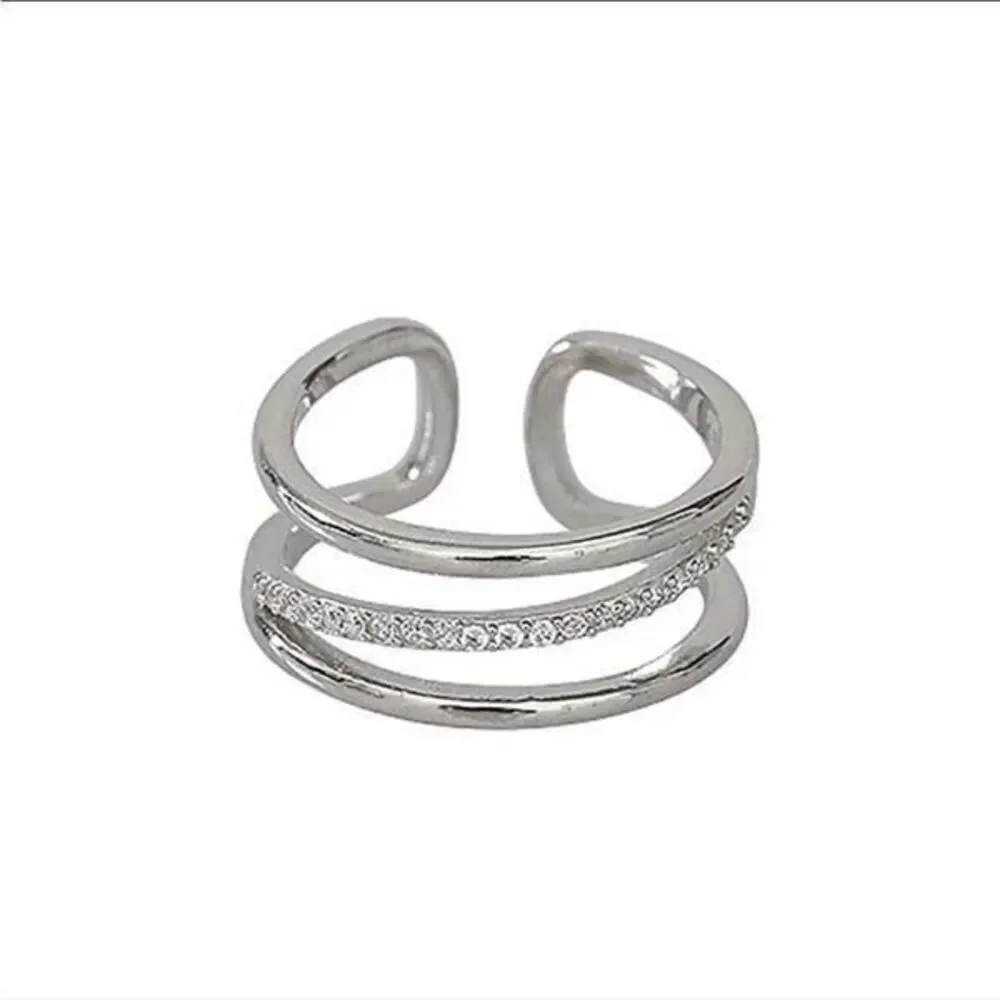 - The Triple Bling Ring adjustable in  925 silver & cubic zirconia
